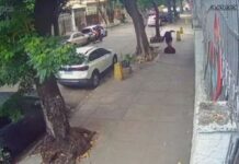 Mulher cai em bueiro no Rio após tampa ceder; veja vídeo Mulher cai em bueiro no Rio após tampa ceder; veja vídeo